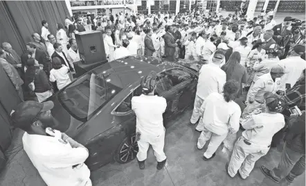  ?? ?? A crowd gathers around Gov. Mike Dewine and the new Honda Accord as the company introduces its new version of the Accord that is made at the Marysville Auto Plant. The event also marks the 40th anniversar­y of Honda making cars in Ohio.