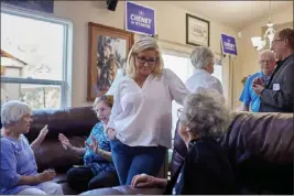  ?? STEPHEN SPERANZA — THE NEW YORK TIMES ?? Rep. Liz Cheney, R-Wyoming, meets with supporters in Cheyenne, Wyoming, on Friday. Cheney says her crusade to stop former President Donald Trump will continue — even if she loses her primary next week.