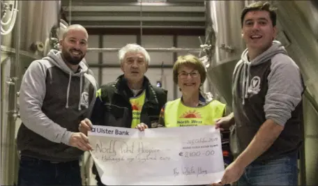  ??  ?? Paul Mullin (The White Hag) (left) presenting Dolores and Gabriel Finan (North West Hospice) a cheque for €2,100 from the White Hag’s annual beer festival Hagstravag­anza. On the right is Bob Coggins (The White Hag)