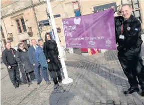  ??  ?? Top town Celebratin­g success at County Square, from left, community firefighte­r Steven Smith; vice chair of Paisley West and Central Community Council, Margaret Dymond; chair of Paisley First, Ian Henderson; Cheryl Adair, of Paisley Street Pastors;...