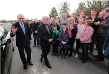  ??  ?? US Senator George Mitchell (left) and Fr Gerry Comiskey at the peace monument at Aghalane, Co Cavan. Photo: Niall Carson