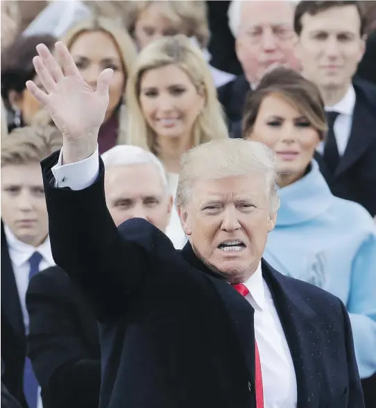  ?? PATRICK SEMANSKY/THE ASSOCIATED PRESS ?? President Donald Trump spoke Friday of putting “America first” as he addressed both his country and the world in an inaugural speech from Washington after being sworn in as 45th president of the United States.