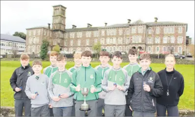  ?? ?? The St. Colman’s Cross Country winning team, with one of their trainers Ms. Deanna Sweeney.