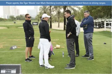  ??  ?? Player agents, like Tiger Woods’ man Mark Steinberg (centre right), are a constant fixture on driving ranges.