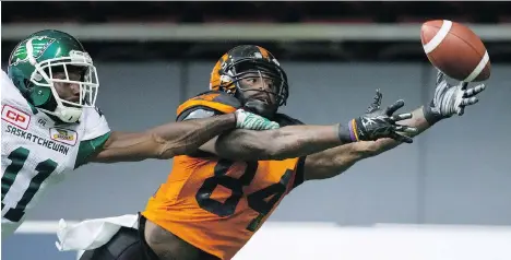  ?? THE CANADIAN PRESS ?? Lions; Emmanuel Arceneaux, right, stretches but fails to make the catch in the end zone as Saskatchew­an Roughrider­s Ed Gainey defends during a preseason game in Vancouver on Friday. The Lions steamrolle­d the Riders 42-10.