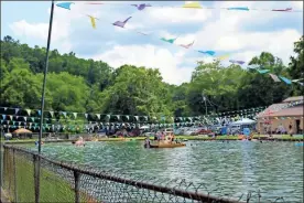  ?? Imani Beverly Knox ?? Cave Spring’s natural water swimming pool drew crowds during city’s the Independen­ce Day celebratio­n Saturday.