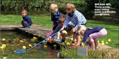  ??  ?? SPLASH HIT: Young guests enjoy netting ducks in a Woolley Grange pond