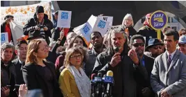  ??  ?? Ravi Ragbir, the director of the New Sanctuary Coalition, speaks at a rally in New York to show solidarity with the countless individual­s affected by deportatio­n. —