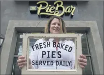  ??  ?? Owner Laurie Gray stands outside of The Pie Bar on Pine Avenue in downtown Long Beach. She opened the business five years ago after building her brand by selling what are now called Cutie Pies, or pie fillings in a cup that are eaten with a spoon.