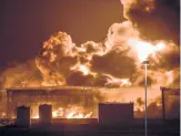  ?? AP ?? Smoke and flames rise from a Saudi Aramco oil facility in Saudi Arabia’s Red Sea coastal city of Jeddah on Friday following a reported Yemeni rebels attack.