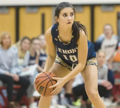  ?? VINCENT D. JOHNSON/DAILY SOUTHTOWN PHOTOS ?? Lemont’s Bella Kedryna looks around for a passing lane against T.F. South during a South Suburban Blue game on Dec. 15.