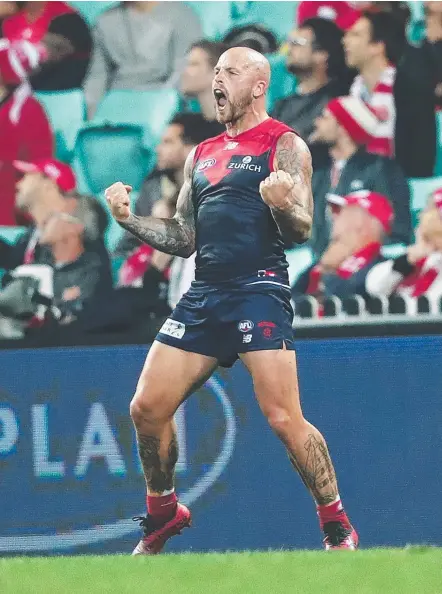  ?? Picture: PHIL HILLYARD ?? Melbourne's Nathan Jones celebrates kicking a goal during his side’s win over the Swans last night.