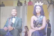  ?? Dlamini) (Pics: Mxolisi ?? Mr and Miss Freshers Kwaluseni Campus Siphesihle Mlotsa (L) Nolwazi Mkhatjwa gesture after being crowned.