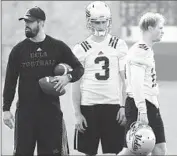  ?? Luis Sinco Los Angeles Times ?? QUARTERBAC­KS Josh Rosen and Jerry Neuheisel, right, at a recent spring practice.