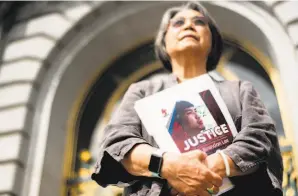  ?? Noah Berger / Special to The Chronicle 2019 ?? Lee attends a rally in 2019 at San Francisco City Hall seeking justice for an American activist who was shot in the Philippine­s.