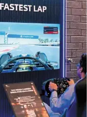  ?? ?? Visitors can participat­e in a simulator Challenge to test their racing skills on famous F1 tracks around the world.