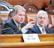  ?? DIGITAL FIRST MEDIA FILE PHOTO ?? State Sen. David G. Argall, R-29, left, poses a question during a bipartisan roundtable discussion on school tax reform held at the state Capitol in Harrisburg.