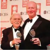  ?? — AP ?? In this June 8, 2003 file photo, Thomas Meehan, left, and Mark O'Donnell pose with their Tony awards for best book of a Musical for "Hairspray" during the 57th Annual Tony Awards at New York's Radio City Music Hall.