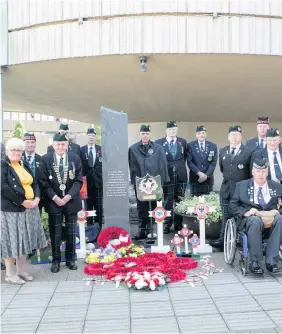  ??  ?? Never to be forgotten Councillor Johnston attended the annual Far East Prisoners of War commemorat­ion at Motherwell Civic Centre