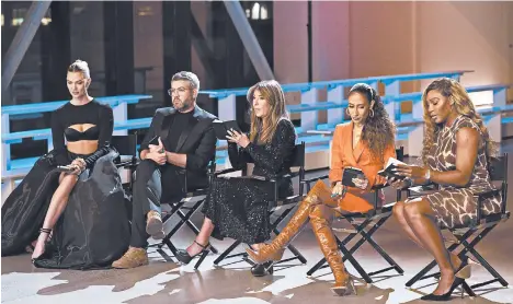  ??  ?? Karlie Kloss, from left, Brandon Maxwell, Nina Garcia, Elaine Welteroth and Serena Williams appear in “Project Runway.”