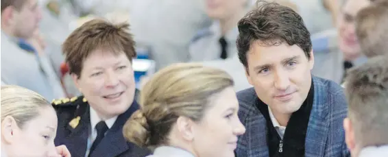  ??  ?? Brenda Lucki and Prime Minister Justin Trudeau at the RCMP depot in Regina in January 2017. Trudeau is expected to name Lucki today as the force’s new commission­er.