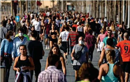  ?? AP ?? SIGH OF RELIEF: People exercise on a seafront promenade in Barcelona on Saturday. Spaniards have filled the streets of the country to do exercise for the first time after seven weeks of confinemen­t in their homes to fight the coronaviru­s pandemic. —