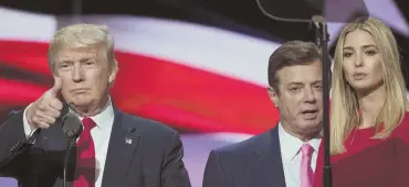  ?? AP FILE PHOTO ?? NOT SO THUMBS UP: Then-candidate Donald Trump is seen with then-campaign chairman Paul Manafort, center, and daughter Ivanka at the 2016 GOP National Convention in Cleveland.