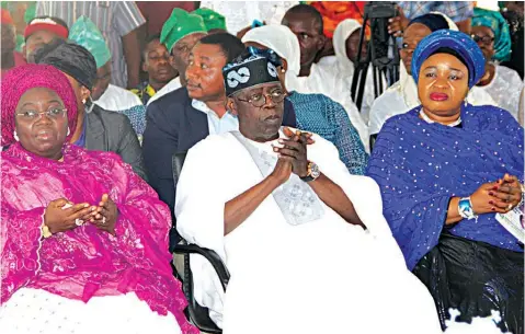  ??  ?? Lagos State Deputy Governor, Idiat Oluranti Adebule; former Lagos State Governor and APC National Leader, Asiwaju Bola Ahmed Tinubu and representa­tive of the wife of the Lagos State Governor, Ronke Solomon, during the 8th Day Fidau prayer for Alhaja...