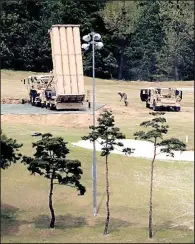  ?? AP/KIM JUN-BEOM ?? A U.S. missile-defense system called Terminal High Altitude Area Defense is installed Tuesday at a golf course in Seongju, South Korea.