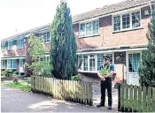  ??  ?? Police outside Darren Osborne’s house in Cardiff yesterday