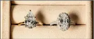  ?? (The Philadelph­ia Inquirer/TNS/Jessica Griffin) ?? A pear-shaped lab diamond (left) and an oval-shaped mined diamond are seen at Philadelph­ia’s L. Priori Jewelry.