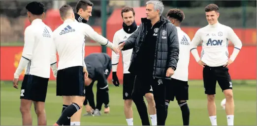  ?? PICTURE: PRESS ASSOCIATIO­N ?? MAN IN THE MIDDLE: Manchester United manager Jose Mourinho, centre, during training.