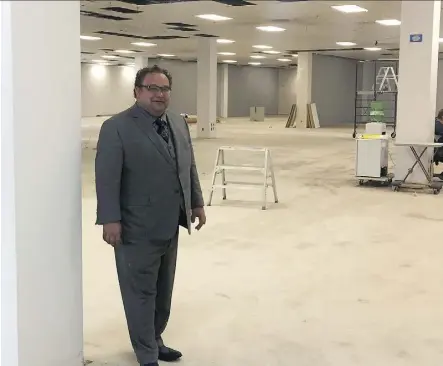 ?? DUSTIN COOK ?? MaKami College marketing director Vladimir Pavkovic stands on the first floor of the college’s new 10,219-square-metre campus, previously home to a Sears store that closed in January 2017.