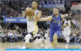  ??  ?? DALLAS: Golden State Warriors guard Stephen Curry (30) is chased by Dallas Mavericks guard J.J. Barea (5) during the first half of an NBA basketball game in Dallas, Monday. — AP