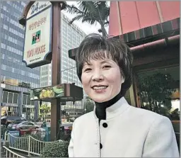  ?? Spencer Weiner Los Angeles Times ?? ‘A DIPLOMAT’ FOR KOREAN FOOD Hee-sook Lee outside the first BCD Tofu House, on Vermont Avenue. “To succeed in anything, you just have to be fanaticall­y devoted to it,” she said