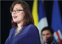  ?? CP FILE PHOTO ?? The Alberta government has tabled a bill that will make property and adult child support rules the same for married and unmarried couples. Alberta Minister of Justice and Solicitor General Kathleen Ganley speaks during a news conference in Vancouver in 2017.