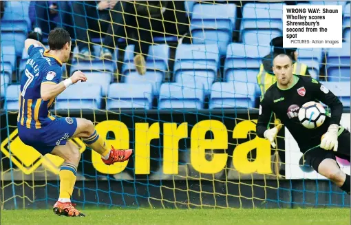  ?? PICTURES: Action Images ?? WRONG WAY: Shaun Whalley scores Shrewsbury’s second from the spot