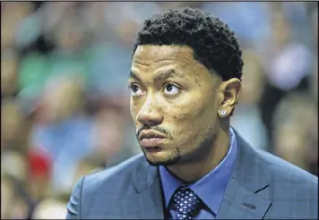  ?? JONATHAN DANIEL / GETTY IMAGES ?? Chicago star Derrick Rose is sidelined again — maybe for the rest of the season for the third time in his career — as he faces surgery on his right knee.