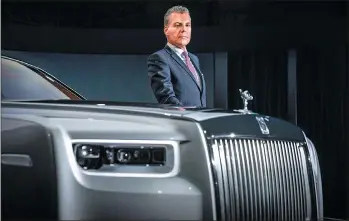  ??  ?? Torsten Muller-Otvos, CEO of Rolls-Royce Motor Cars, introduces the new Phantom.