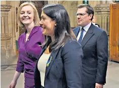  ?? ?? Liz Truss, the Foreign Secretary, and Lisa Nandy, Labour’s shadow levelling up secretary, walk through the Central Lobby at the Palace of Westminste­r ahead of the Queen’s Speech