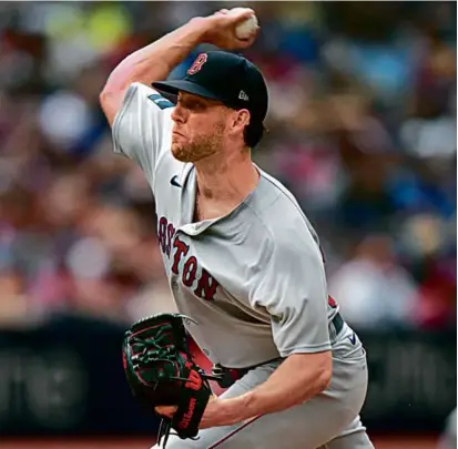  ?? FRANK GUNN/THE CANADIAN PRESS VIA AP ?? Kutter Crawford allowed two runs on three hits in 5„ innings in the Red Sox’ win Saturday.