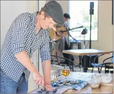  ?? ASHLEY CONDON/SPECIAL TO THE GUARDAN ?? The Suds, Songs and Oysters event on Saturday is a huge hit with locals and tourists at Copper Bottom Brewing.