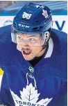  ??  ?? Waiving veteran forward Jason Spezza, top, gave the Maple Leafs some financial room to replace injured rookie Nick Robertson, bottom.