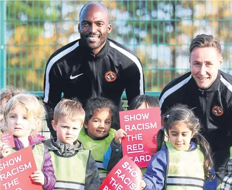  ??  ?? STAFF and students from the University of Dundee went head-tohead in a football match to support the battle against racism.
The match was sponsored by Show Racism the Red Card and was one of the Black History Month events to be organised by Dundee...