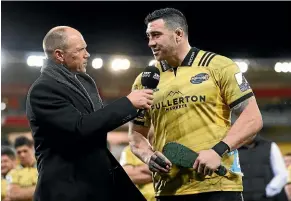  ??  ?? Jeff Toomaga-Allen of the Hurricanes talks to Sky Sport commentato­r Jeff Wilson after his 100th Super Rugby game in 2018.