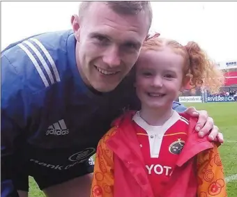  ??  ?? Munster Rugby fan Hanna with hero, Keith Earls.