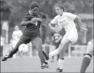  ?? Special to the NWA Democrat-Gazette/DAVID J. BEACH ?? Bryant’s Hadley Dickinson (right), shown trying to clear the ball past Fayettevil­le’s Katie Sykes, scored on a second-half breakaway to give the Lady Hornets their first state title.