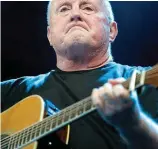 ??  ?? Song to a drink: Singer Christy Moore