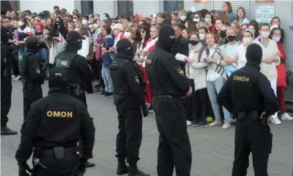  ?? Photograph: EPA ?? Belarusian police prepare to detain participan­ts of the all-women protest in Minsk.