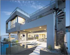  ??  ?? Blue Heron Sky Terrace home designs maximize the 360-degree views and connect the indoor/ outdoor spaces with large pocketing doors and windows, sky decks with entertainm­ent amenities and private interior courtyards.